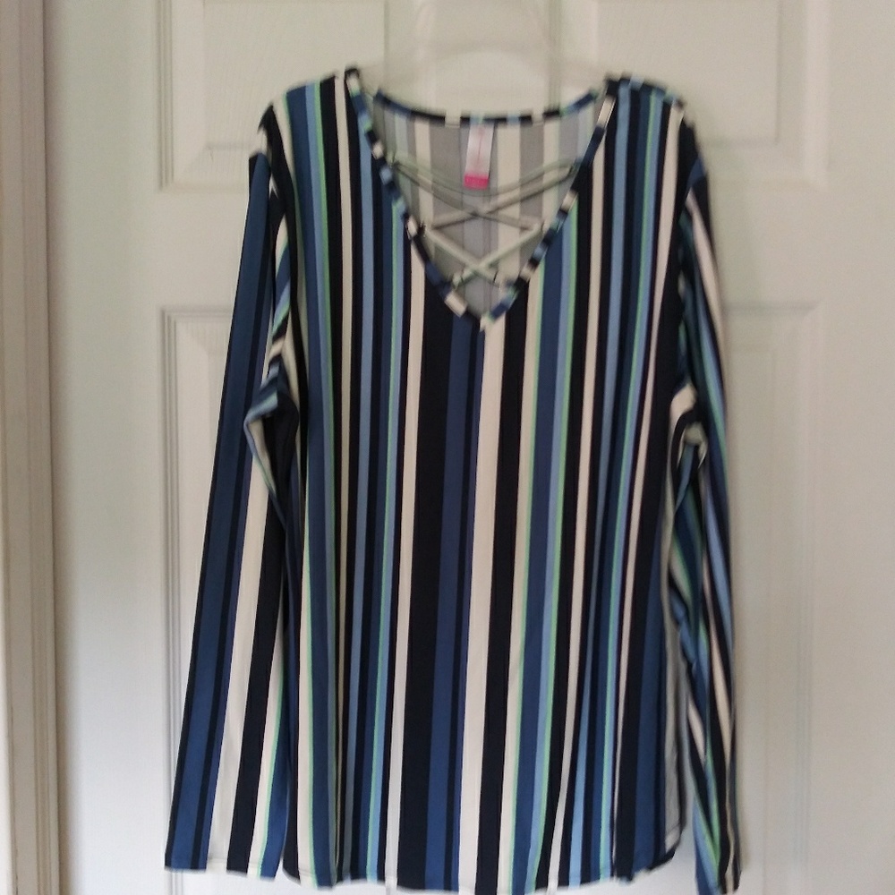 Vertical striped top w/ long sleeves.